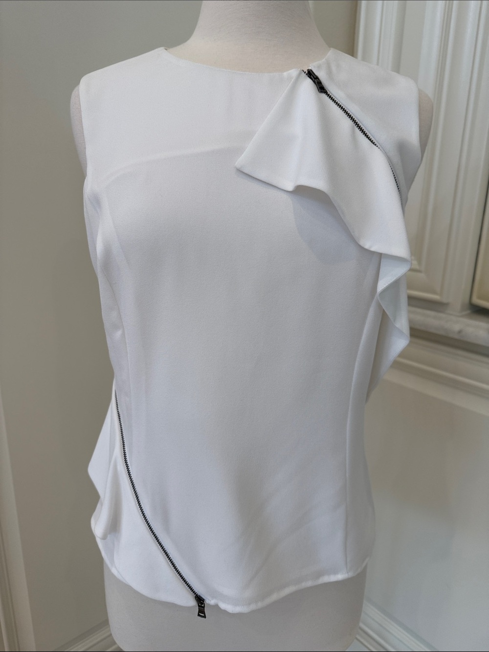 BCBGMaxAzria White Sleeveless Ruffle Zip Top